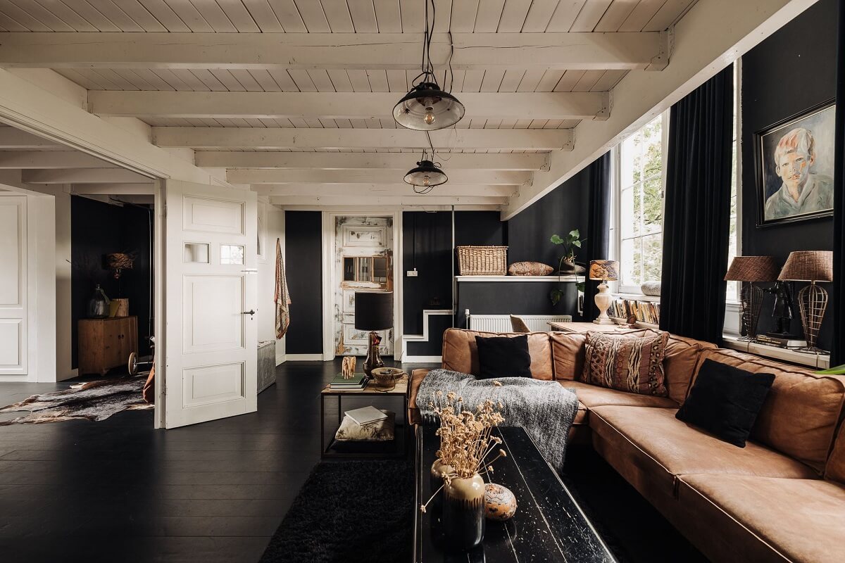 A Unique Black and White Home in a Former School Building 3 black-white-living-room-corner-sofa-nordroom