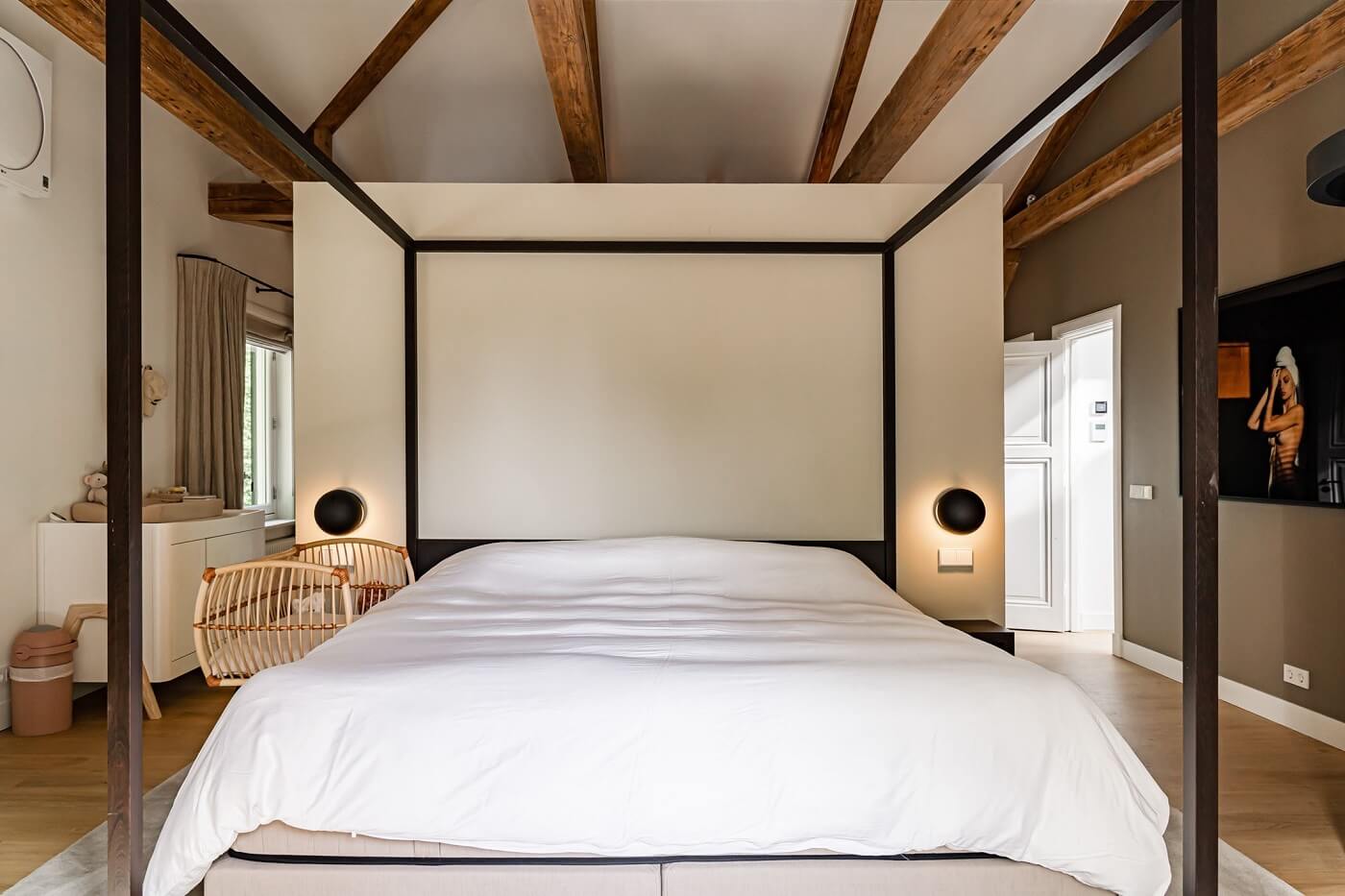 A Luxurious Dutch Villa in a Former Carriage House 18 canopy-bed-wooden-beams-nordroom