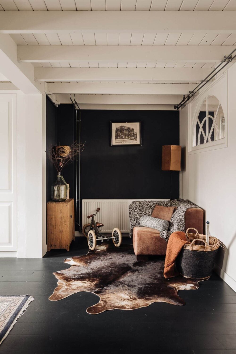 A Unique Black and White Home in a Former School Building 7 corner-seating-black-white-townhouse-nordroom