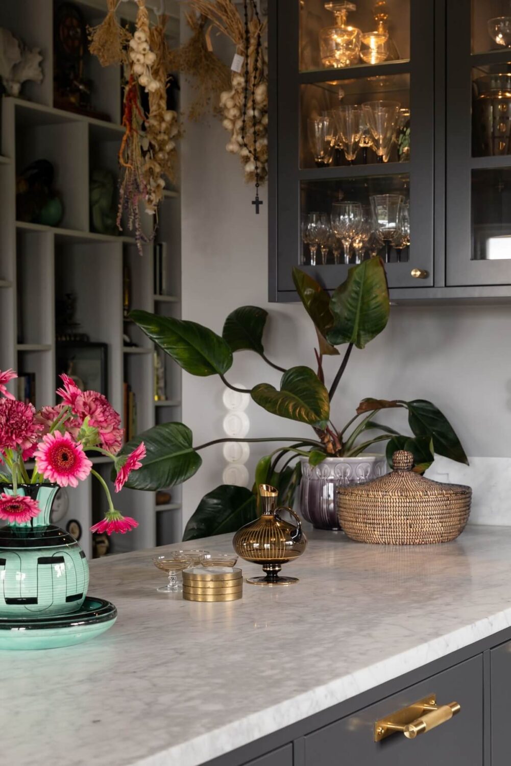 A Scandinavian Home with Purple Color Accents 18 cozy-kitchen-grey-cabinets-nordroom
