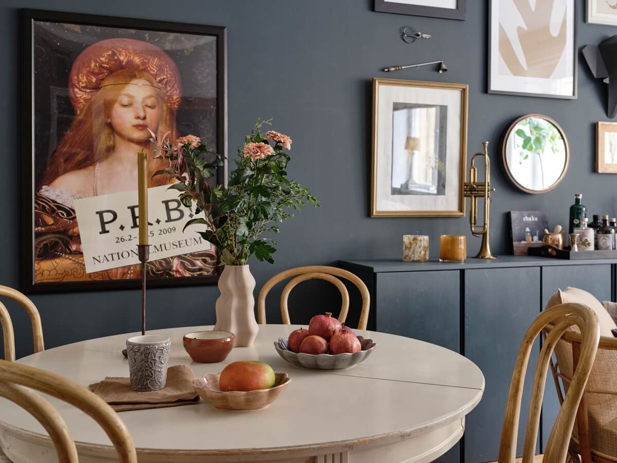 A Small Nordic Home with Dark Blue Accent Walls 7 dark-blue-accent-wall-floating-cabinets-gallery-wall-nordroom