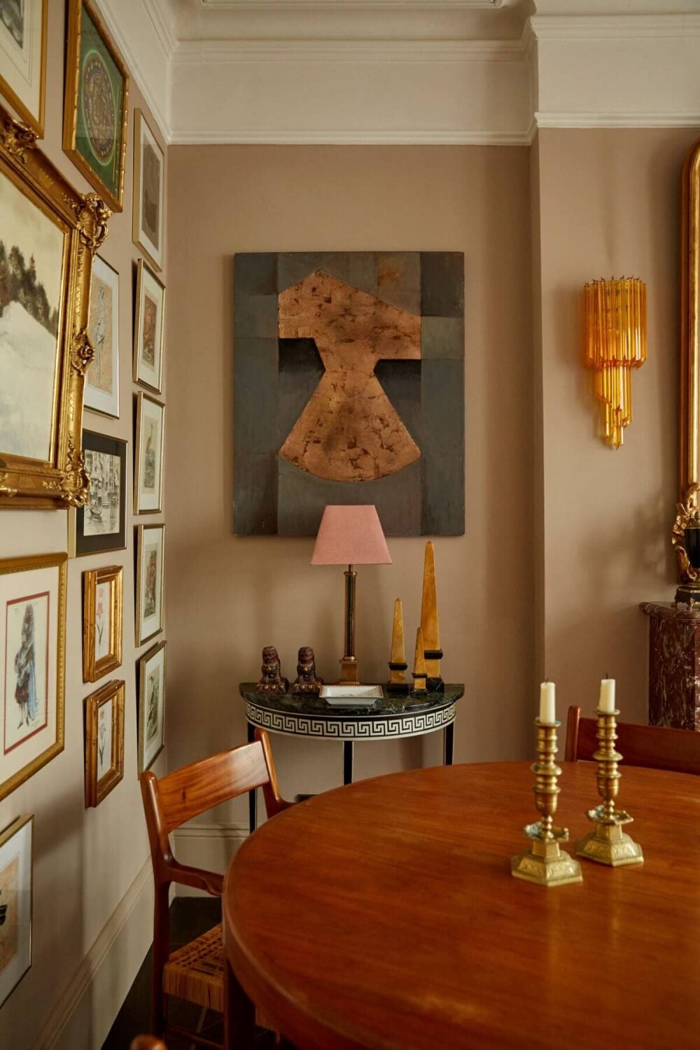 7 Simple Tricks To Make a Low Ceiling Look Taller 2 dining-area-round-wooden-table-gallery-wall-nordroom