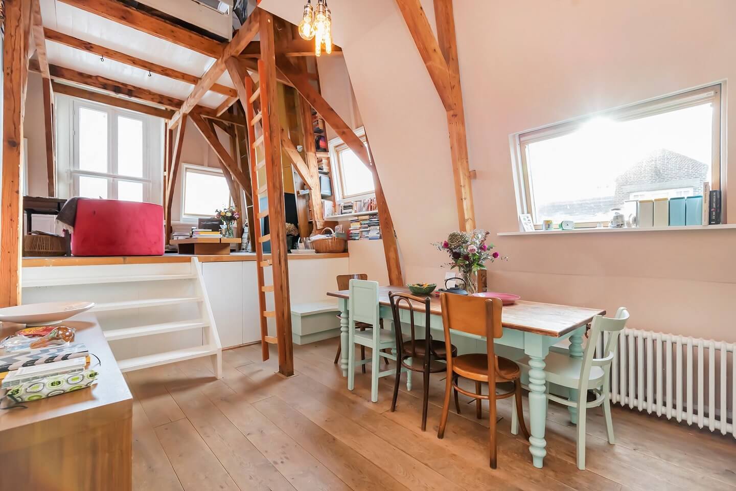 A Colorful Loft in Amsterdam with Exposed Wooden Beams 13 dining-area-wooden-beams-loft-amsterdam-nordroom
