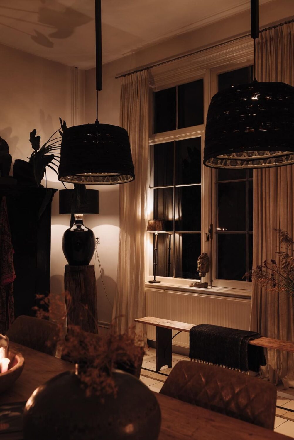 A Unique Black and White Home in a Former School Building 32 dining-room-at-night-nordroom