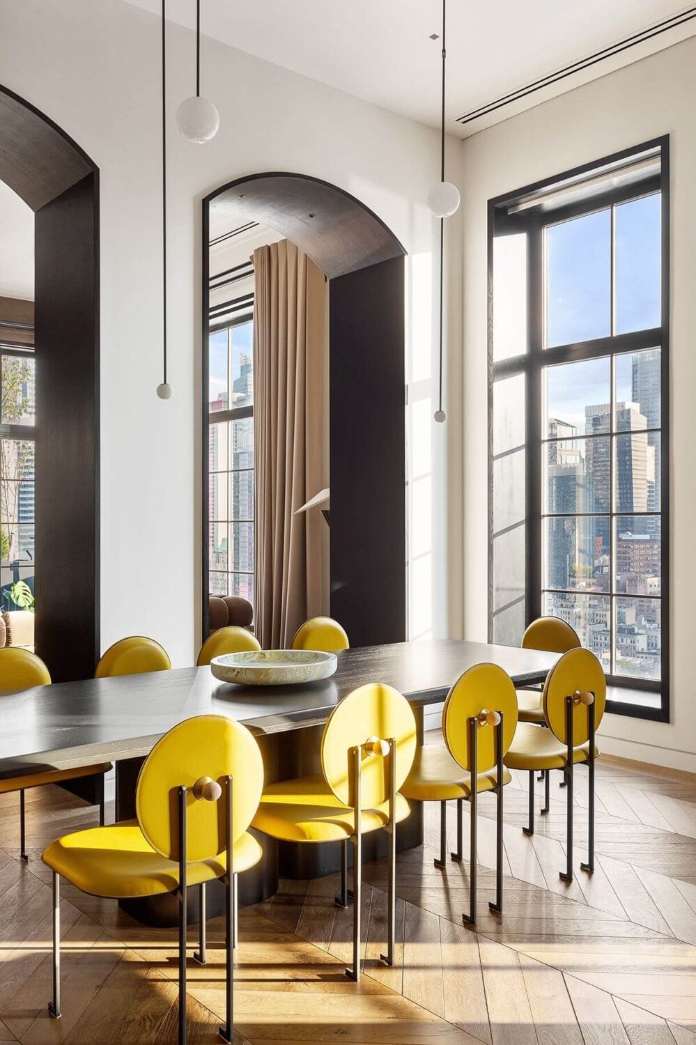 Trevor Noah Sells His Manhattan Penthouse with Roof Terrace 5 dining-room-yellow-chairs-chevron-floor-trevor-noah-penthouse-nordroom