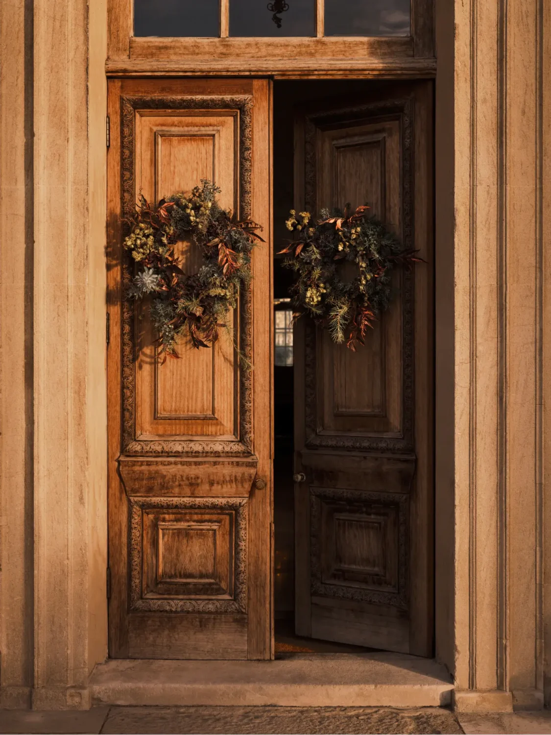 Zara Home Christmas 2022: An Elegant Holiday Season 17 double-wooden-front-door-christmas-wreath-zara-home-nordroom
