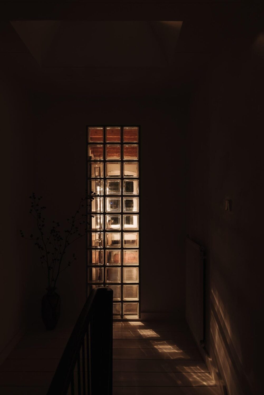 A Unique Black and White Home in a Former School Building 22 dutch-townhouse-at-night-light-nordroom