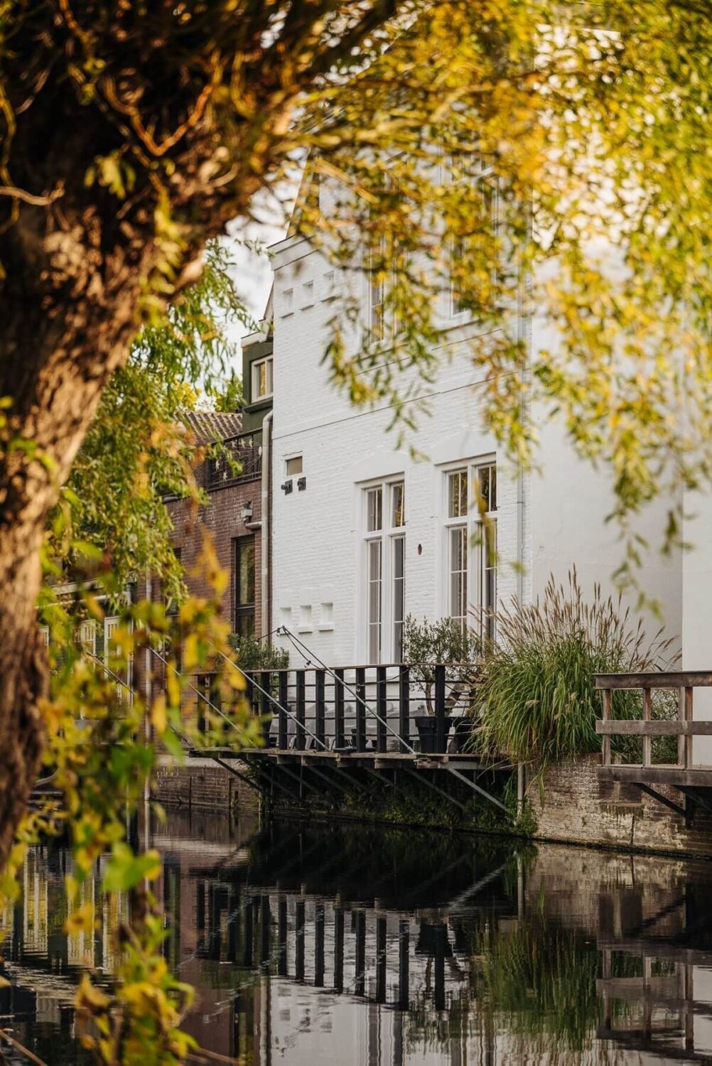 A Unique Black and White Home in a Former School Building 45 exterior-canal-townhouse-netherlands-nordroom