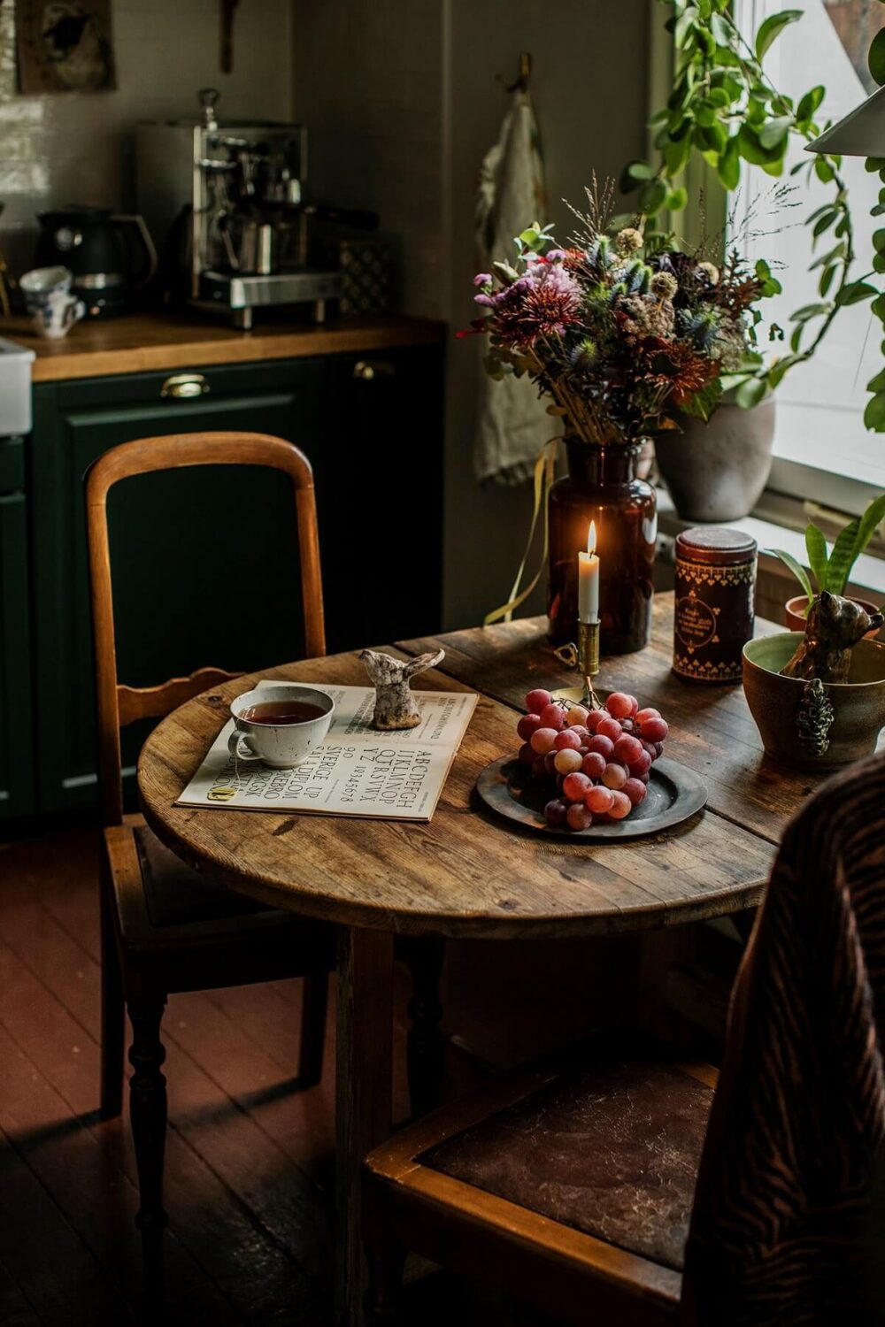 A Cozy Green Kitchen in a Vintage Attic Apartment 3 fold-out-wooden-dining-table-small-kitchen-nordroom