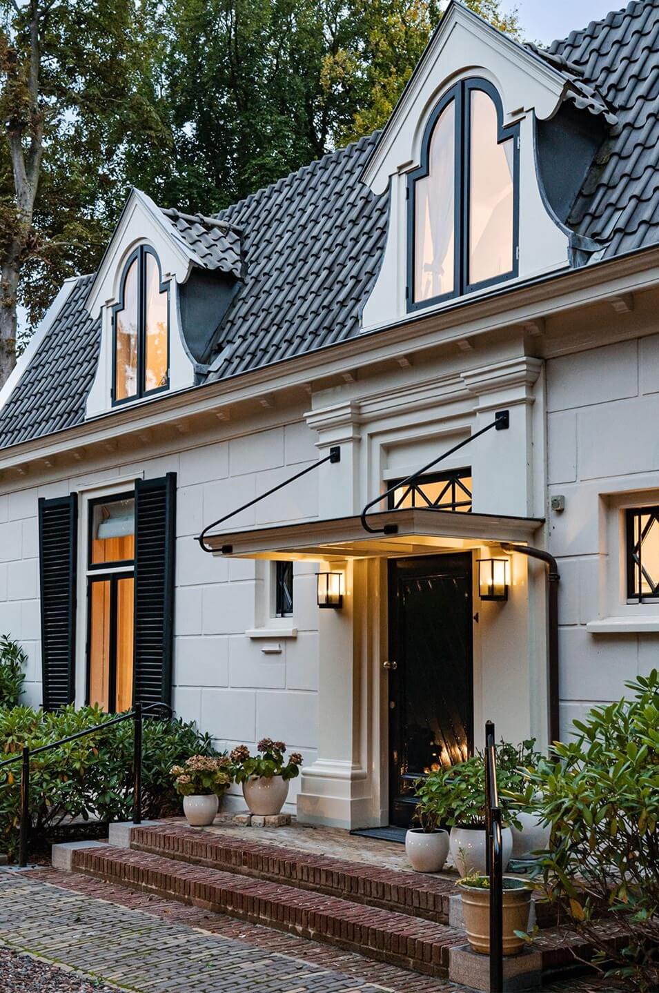 A Luxurious Dutch Villa in a Former Carriage House 2 front-door-white-villa-nordroom