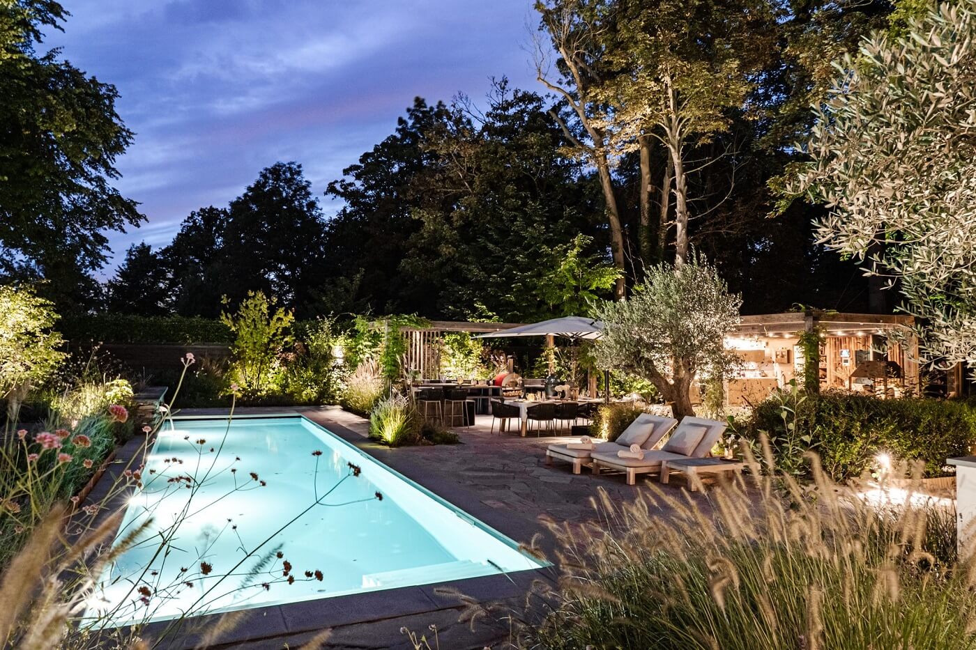 A Luxurious Dutch Villa in a Former Carriage House 31 garden-at-night-swimming-pool-nordroom