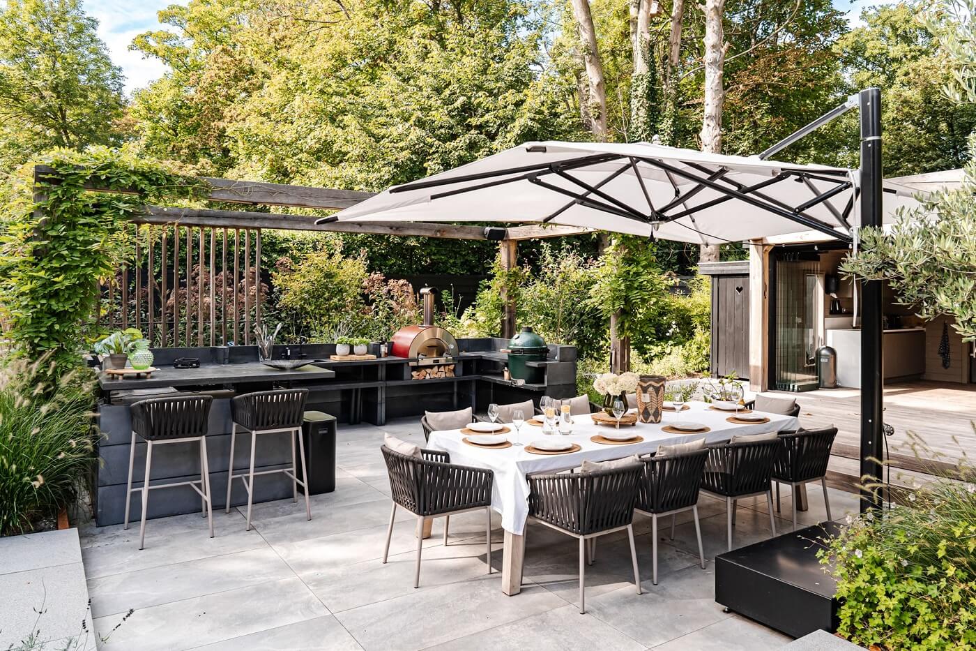 A Luxurious Dutch Villa in a Former Carriage House 27 garden-dining-space-dutch-villa-nordroom