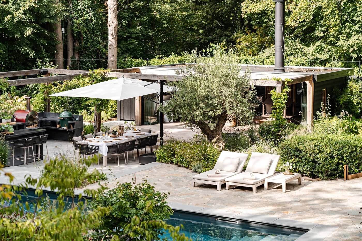 A Luxurious Dutch Villa in a Former Carriage House 25 garden-with-swimming-pool-dutch-villa-nordroom