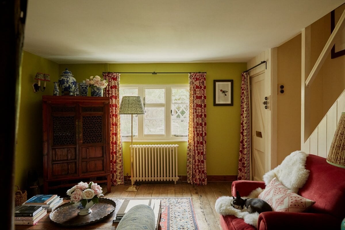 A Charming Arts and Crafts Cottage in the English Countryside 4 green-walls-sitting-room-cottage-england-nordroom