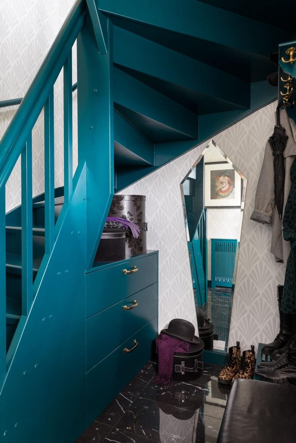 A Scandinavian Home with Purple Color Accents 27 hallway-turquoise-stairs-nordroom