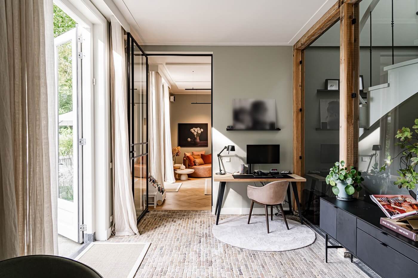 A Luxurious Dutch Villa in a Former Carriage House 6 home-office-brick-floor-exposed-beams-nordroom