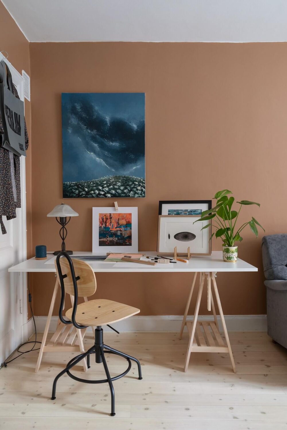 A Cozy Apartment Painted in Warm Natural Colors 7 home-office-ikea-table-warm-walls-nordroom