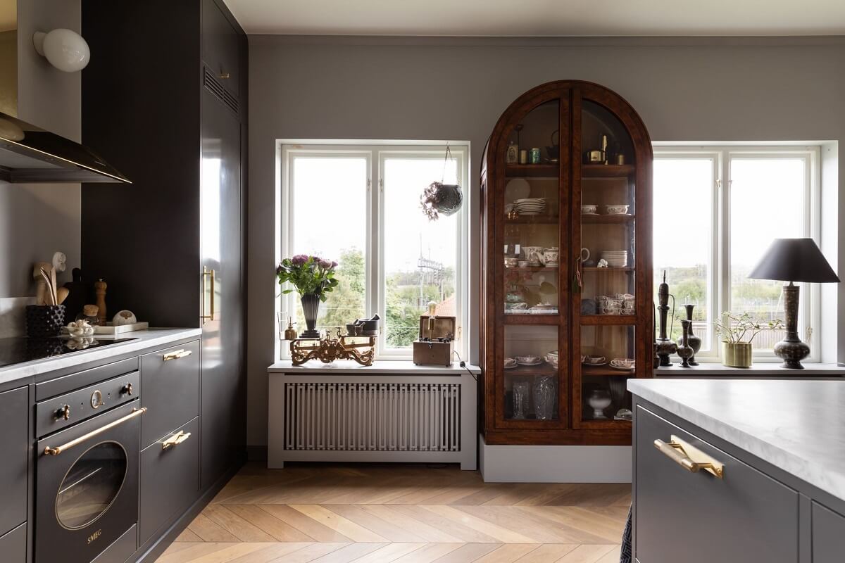A Scandinavian Home with Purple Color Accents 16 kitchen-gray-cabinets-swedish-home-nordroom