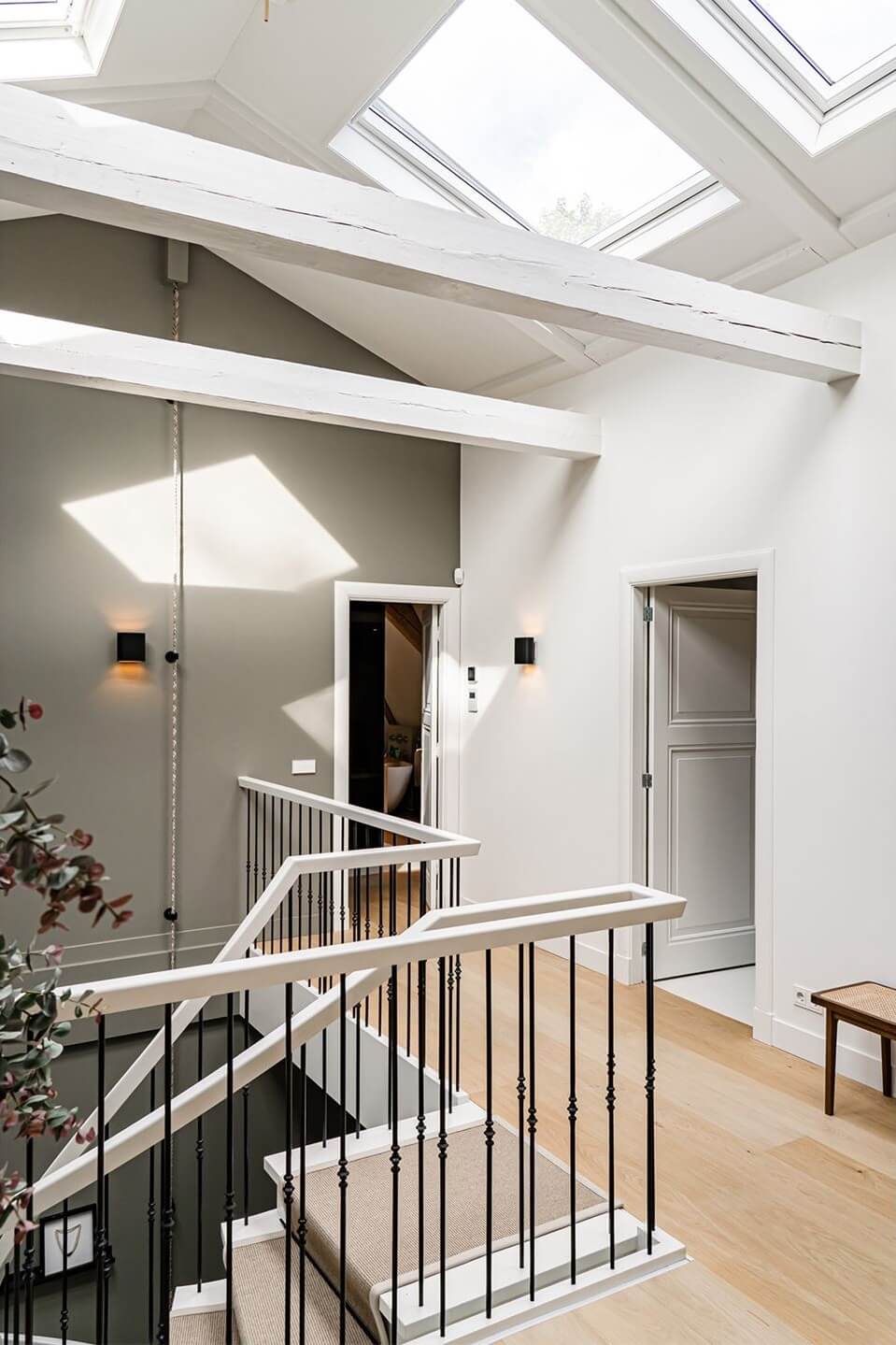 A Luxurious Dutch Villa in a Former Carriage House 16 landing-wooden-beams-skylights-dutch-villa-nordroom