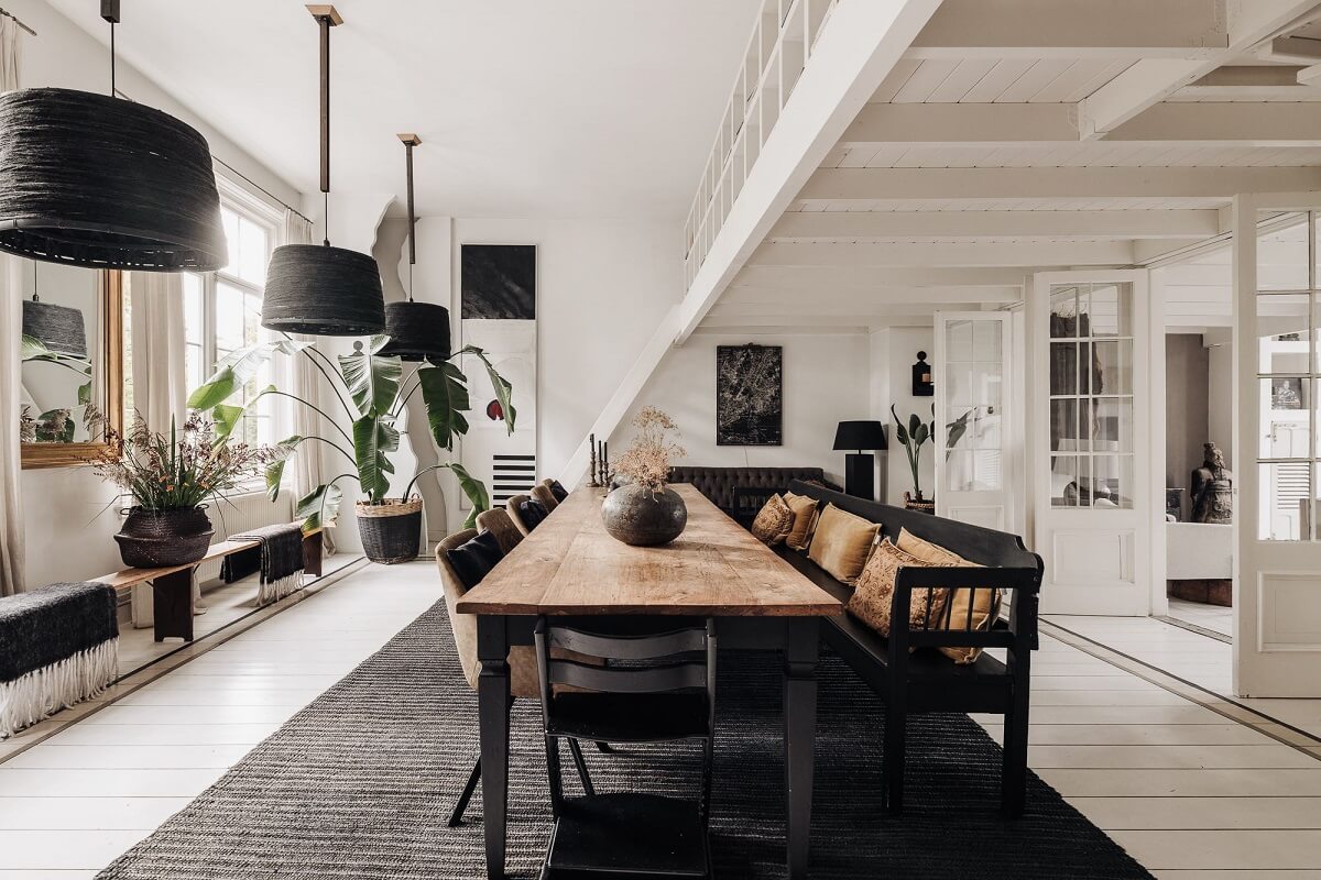 A Unique Black and White Home in a Former School Building 29 large-dining-room-bench-white-floor-nordroom