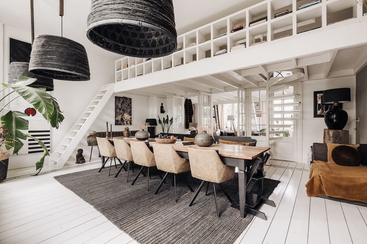 A Unique Black and White Home in a Former School Building 28 large-dining-table-white-floor-loft-space-nordroom