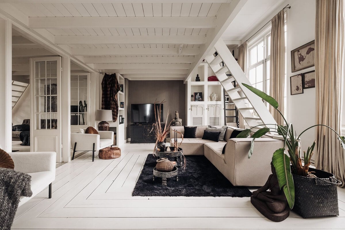 A Unique Black and White Home in a Former School Building 23 light-living-room-loft-space-white-floor-nordroom