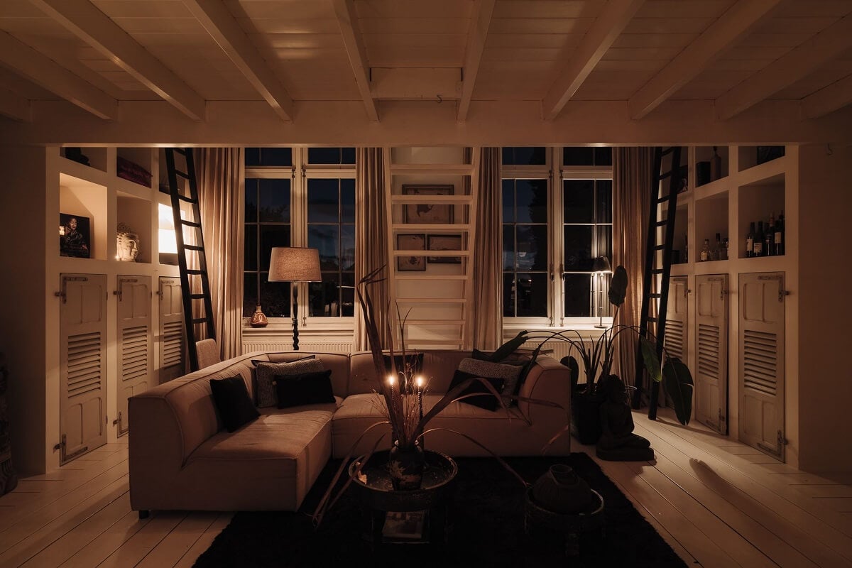 A Unique Black and White Home in a Former School Building 26 living-room-at-night-townhouse-nordroom