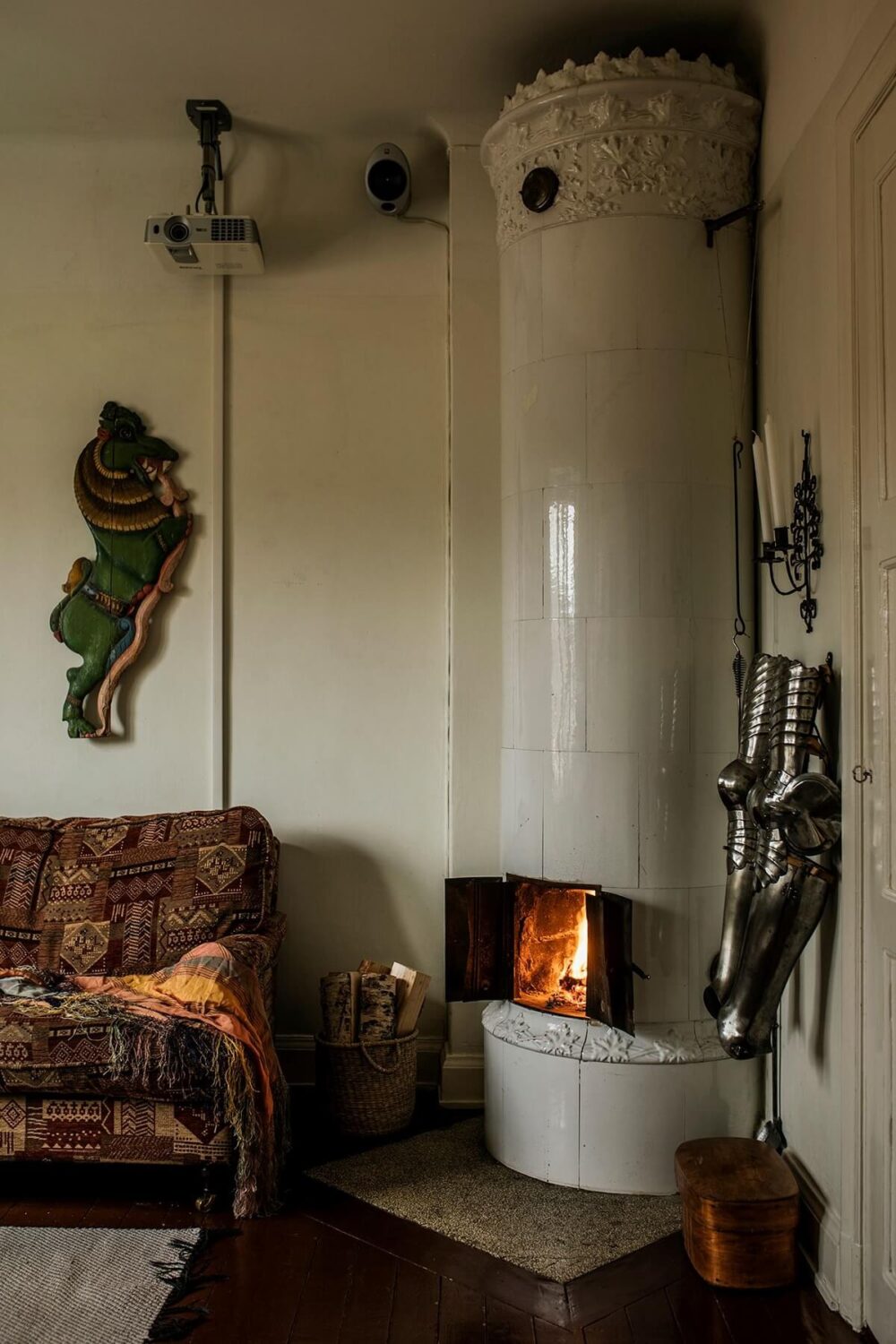 A Cozy Green Kitchen in a Vintage Attic Apartment 11 living-room-detail-tile-firpelace-nordroom