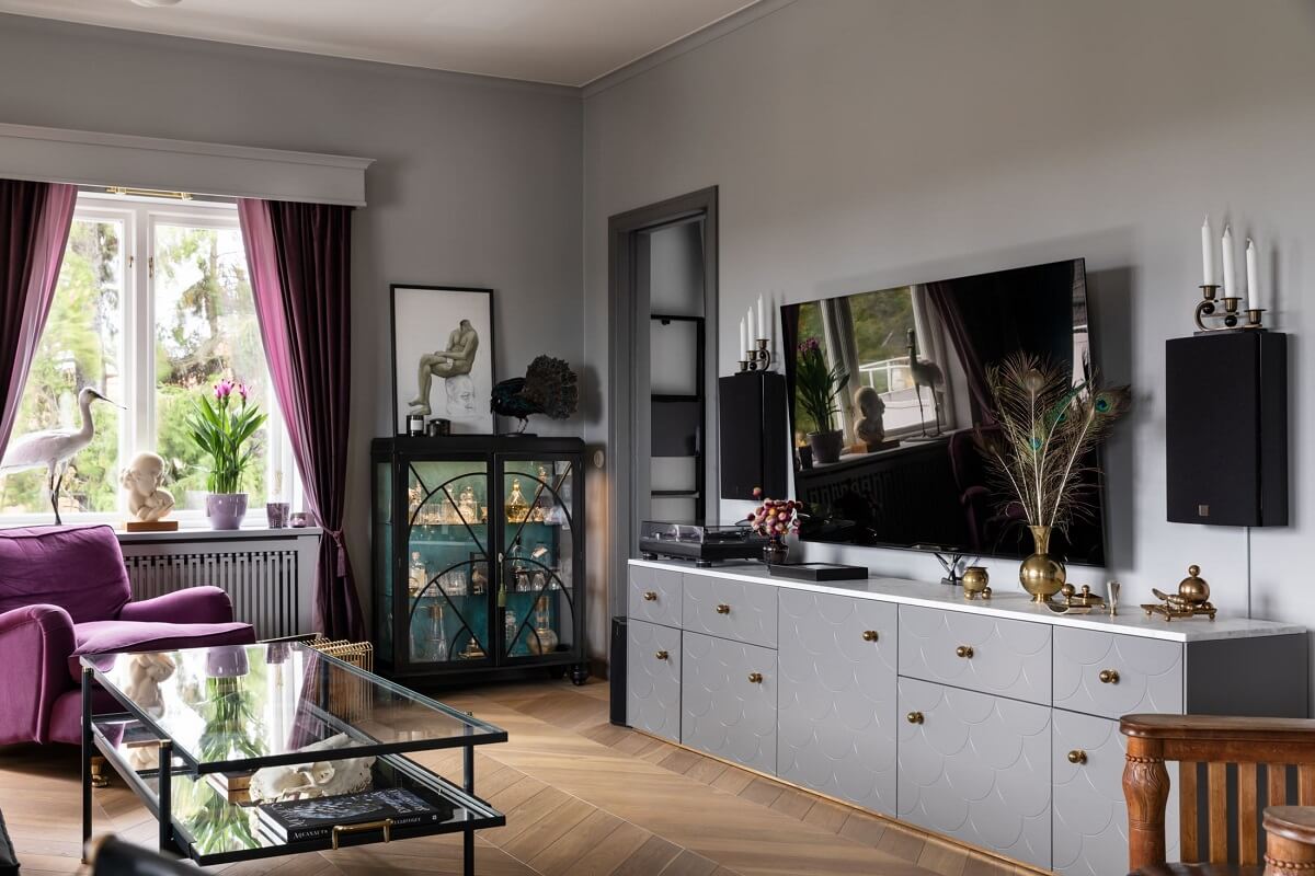 A Scandinavian Home with Purple Color Accents 5 living-room-gray-walls-purple-accent-color-nordroom
