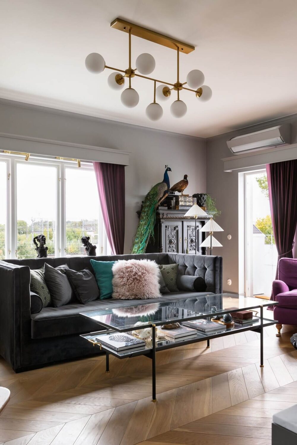 Herringbone vs. Chevron Flooring Patterns: Differences & Inspiration 28 living-room-gray-walls-purple-curtains-nordroom