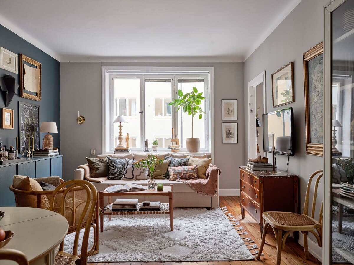 A Small Nordic Home with Dark Blue Accent Walls 2 living-room-light-gray-blue-walls-wooden-floor-nordroom