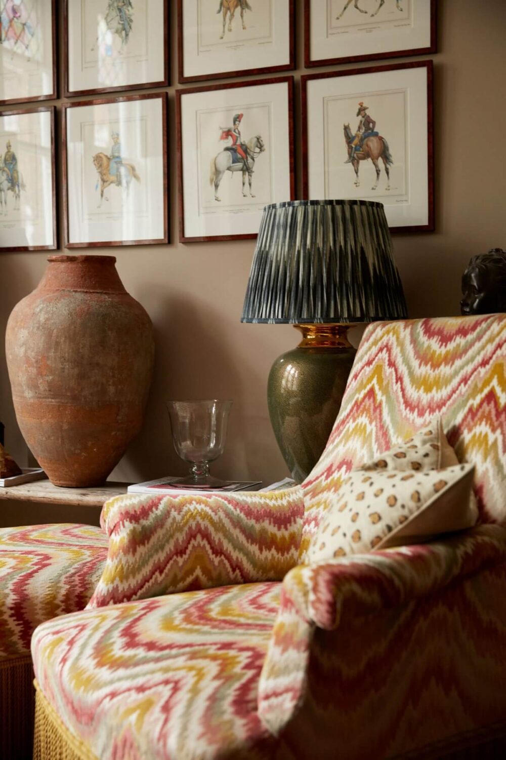 A Charming Antique Apartment in London with a Garden 3 living-room-patterned-armchair-gallery-wall-nordroom