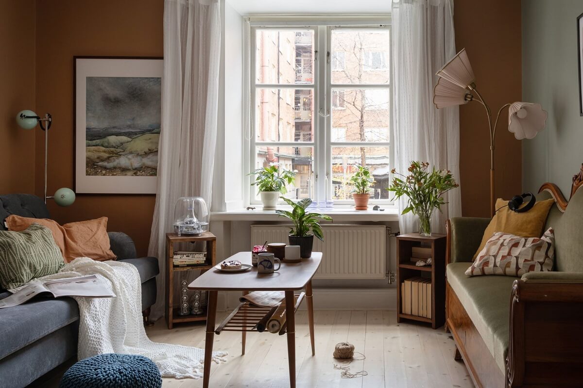 A Cozy Apartment Painted in Warm Natural Colors 4 living-room-vintage-couch-natural-warm-walls-nordroom