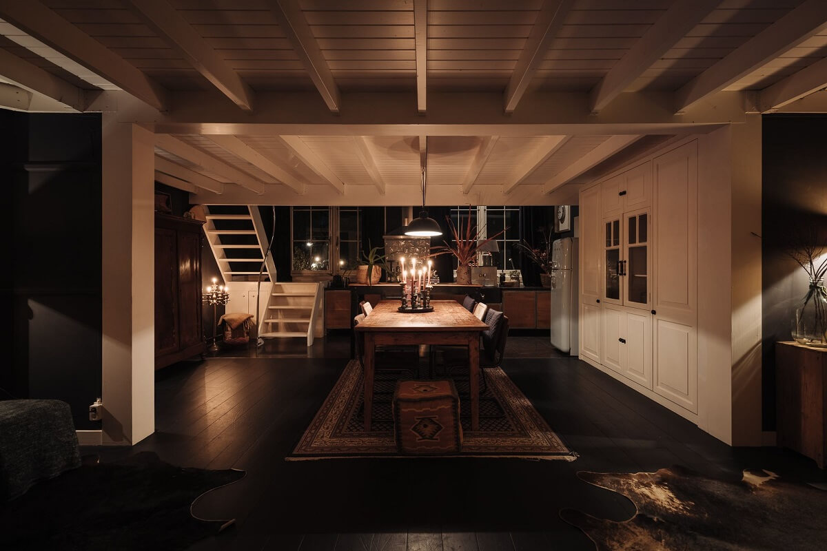 A Unique Black and White Home in a Former School Building 9 living-space-at-night-nordroom