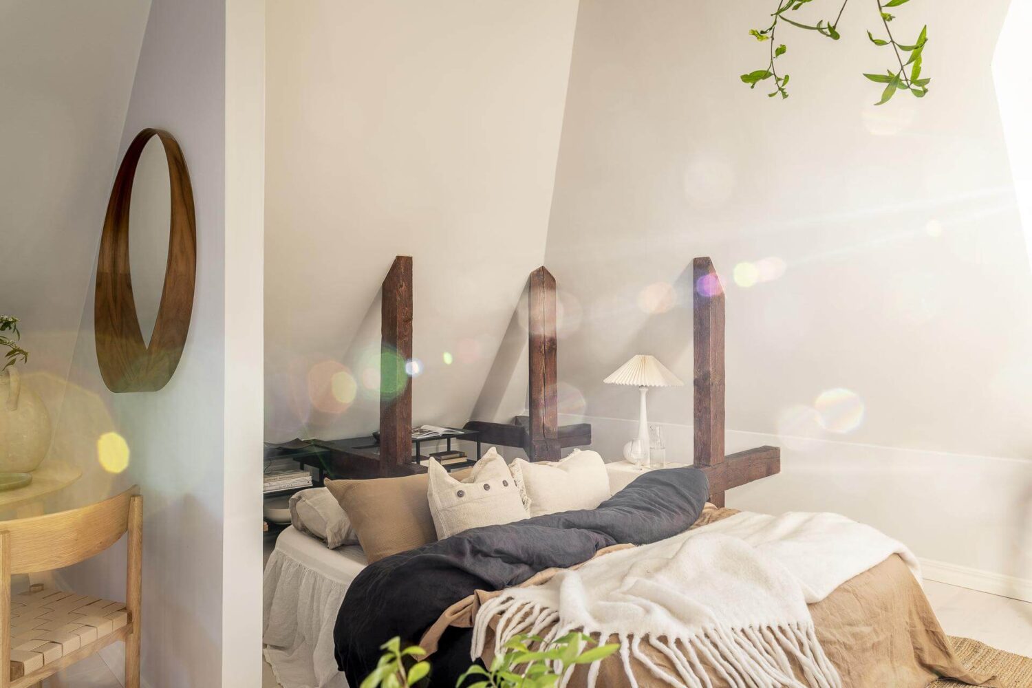 A Small Scandinavian Loft with Beautiful Natural Light 10 loft-bedroom-area-exposed-beams-nordroom