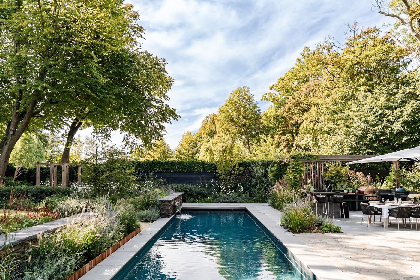 A Luxurious Dutch Villa in a Former Carriage House 26 luxury-garden-swimming-pool-dutch-villa-nordroom