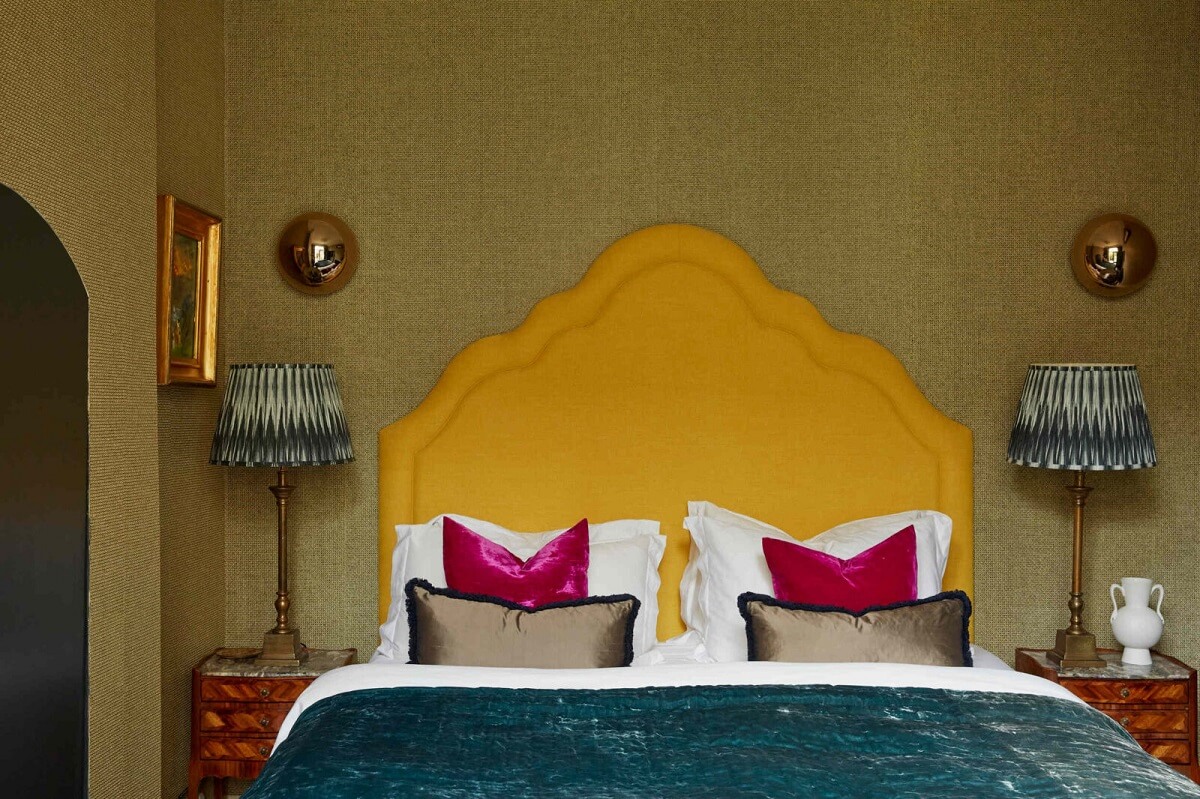 A Charming Antique Apartment in London with a Garden 13 master-bedroom-yellow-headboard-nordroom