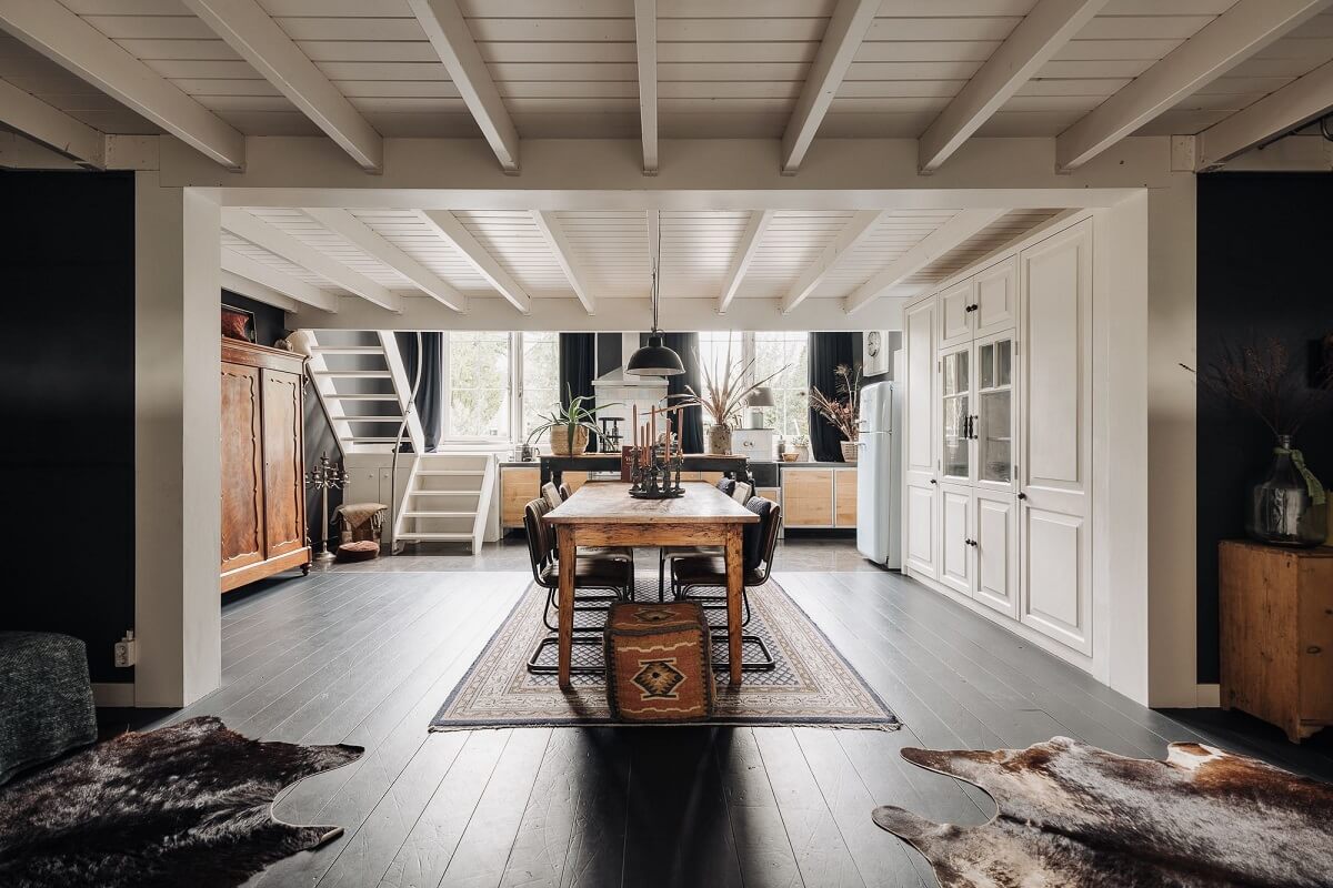 A Unique Black and White Home in a Former School Building 10 open-plan-kitchen-living-room-black-floor-nordroom