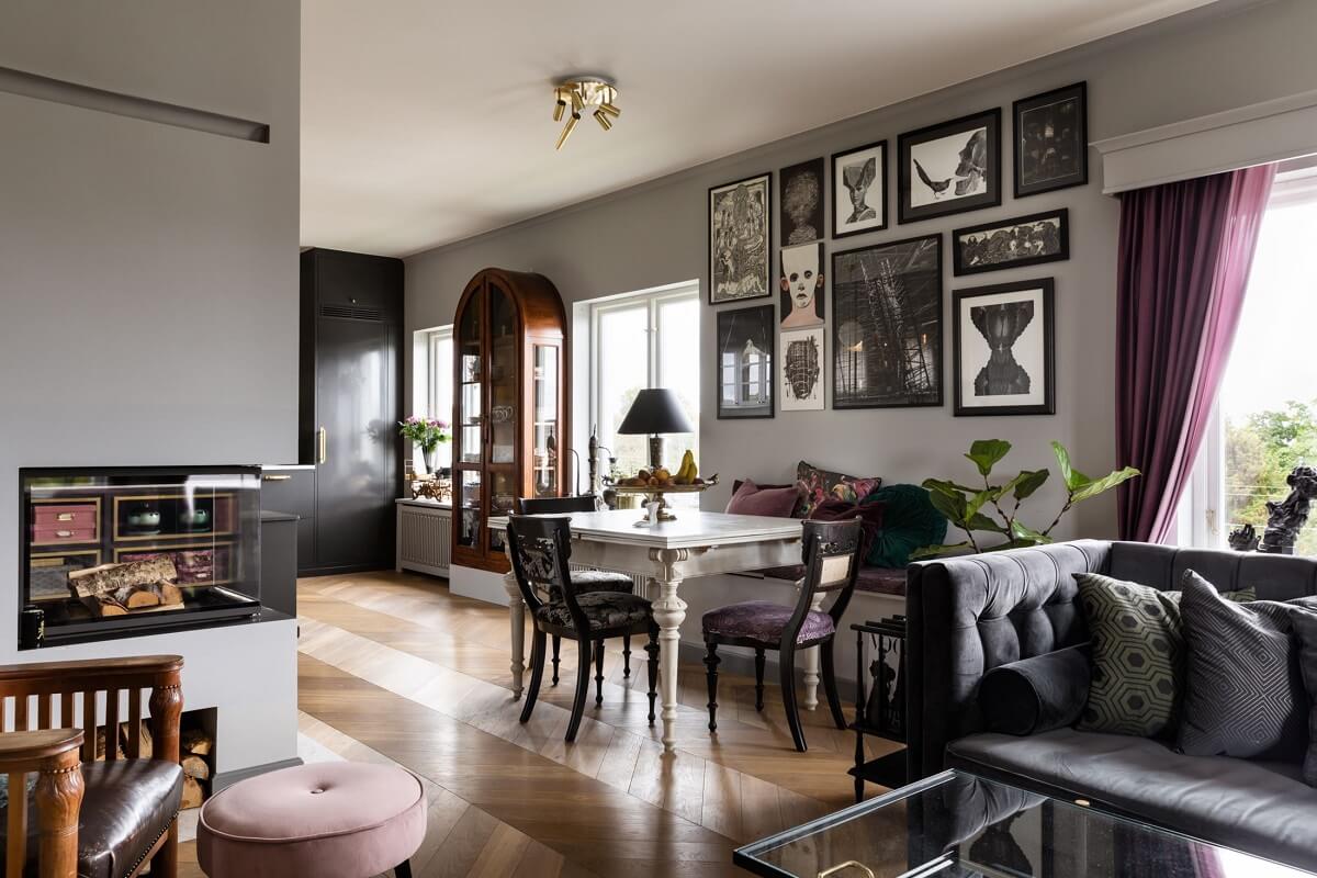 A Scandinavian Home with Purple Color Accents 7 open-plan-living-room-gray-walls-gallery-wall-nordroom