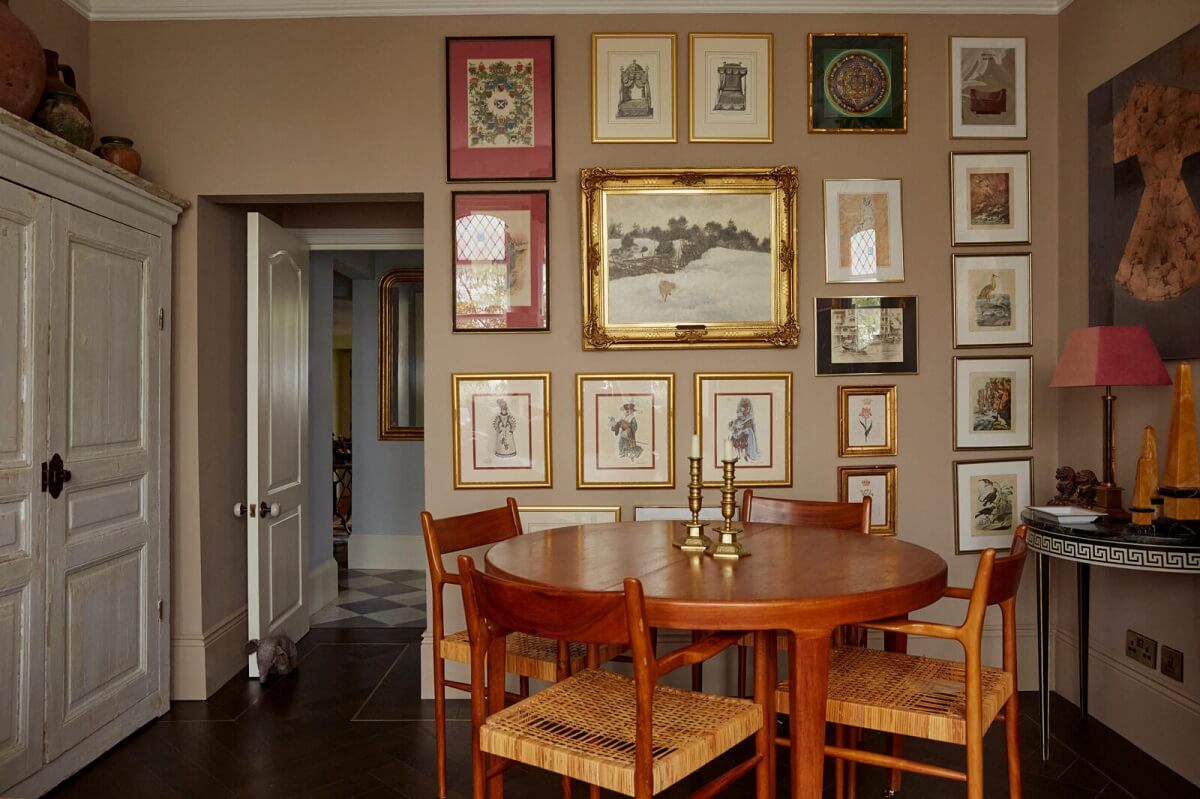 A Charming Antique Apartment in London with a Garden 6 round-dining-table-gallery-wall-nordroom