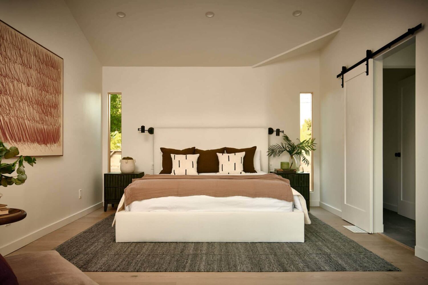 A Stylish Los Angeles Bungalow Renovated by a Designer 11 serene-bedroom-sliding-door-nordrom