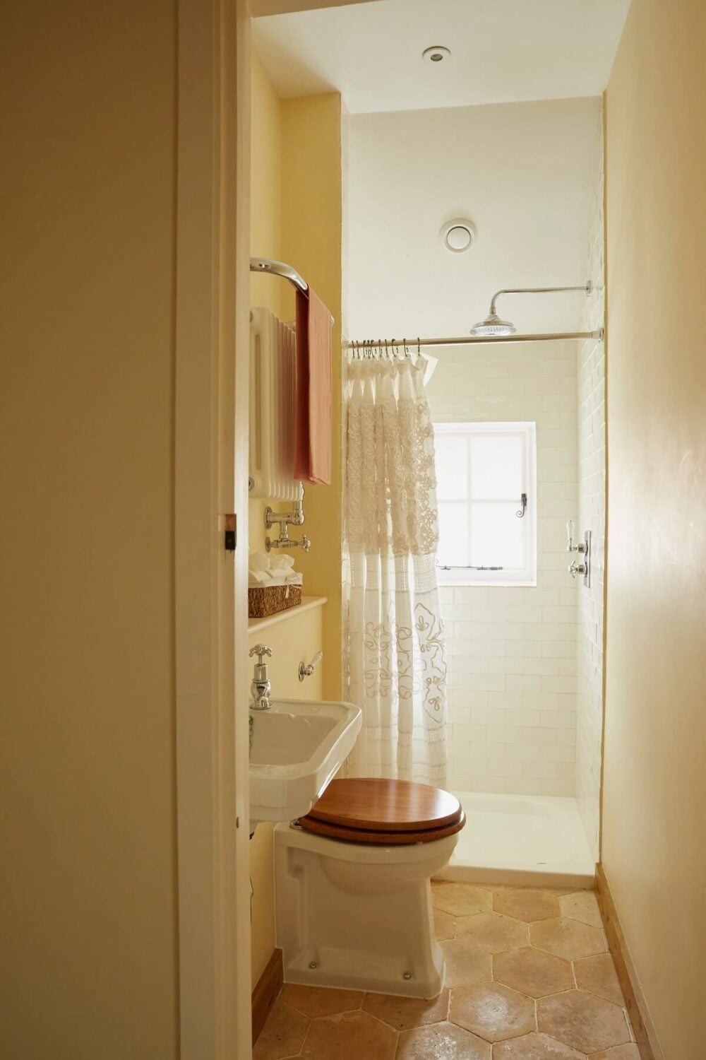 A Charming Arts and Crafts Cottage in the English Countryside 15 small-bathroom-shower-hexagon-floor-tiles-nordroom