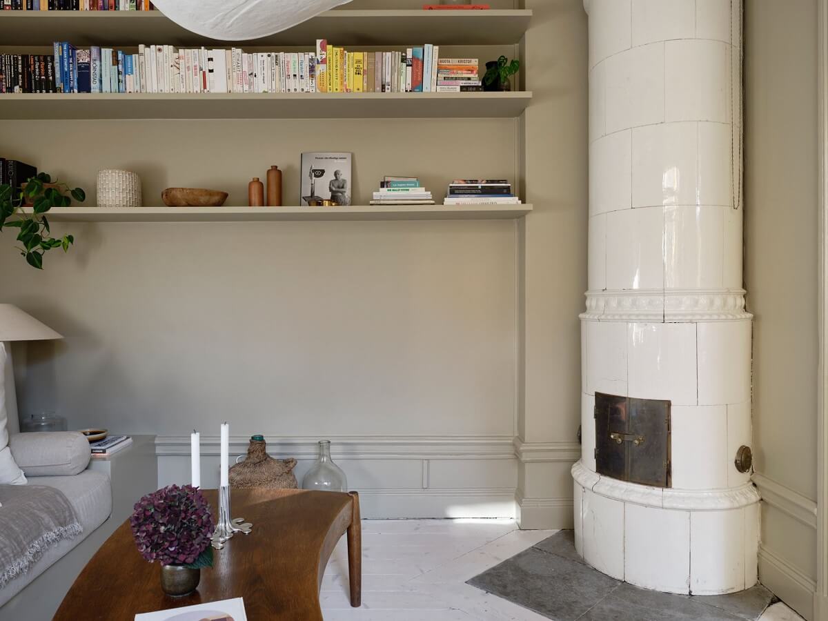 A Nordic Maisonette That Makes The Most Of Its Awkward Nooks 2 small-beige-living-room-tile-firpelace-shelves-nordrom