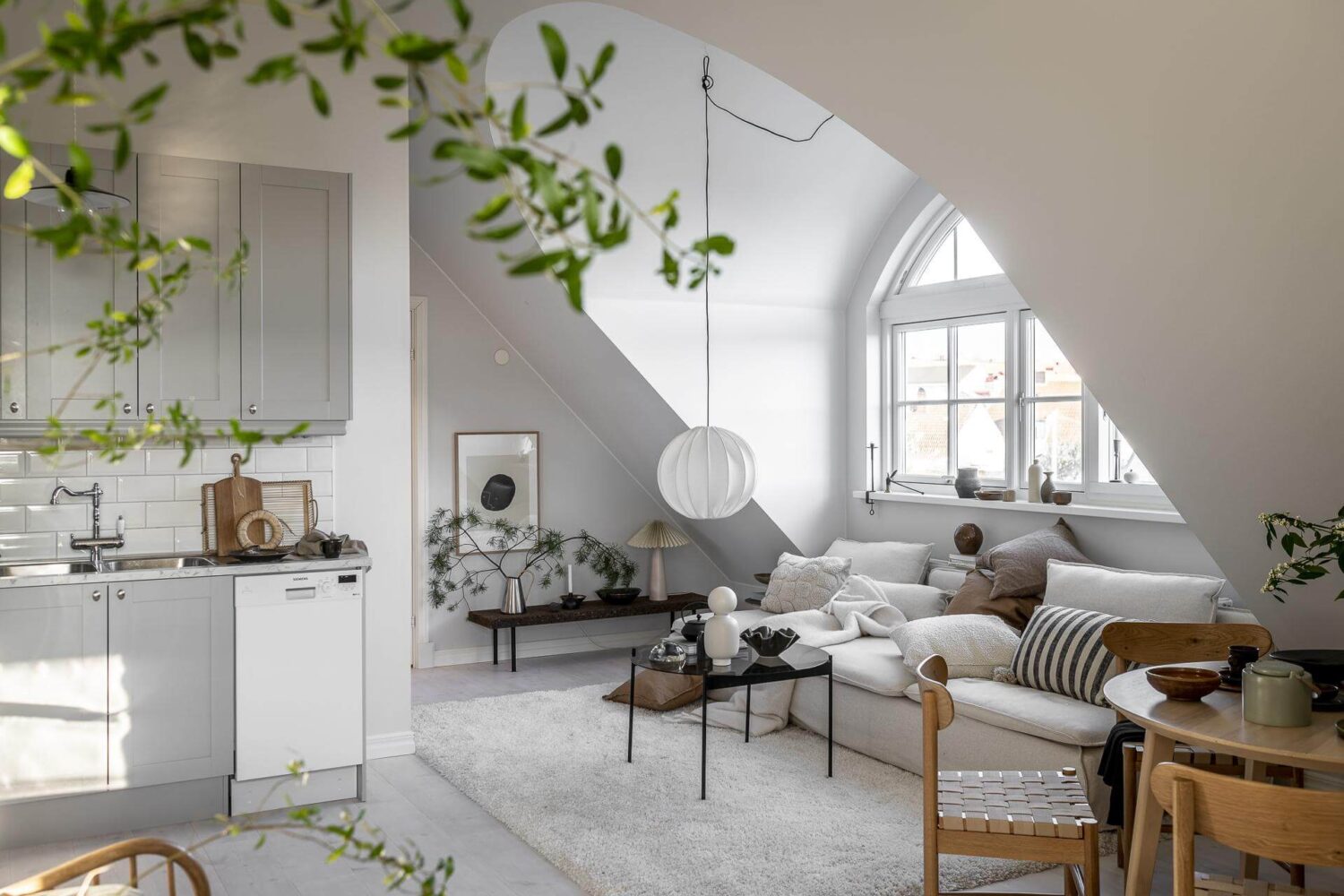 A Small Scandinavian Loft with Beautiful Natural Light 2 small-light-scandinavian-loft-slanted-walls-nordroom