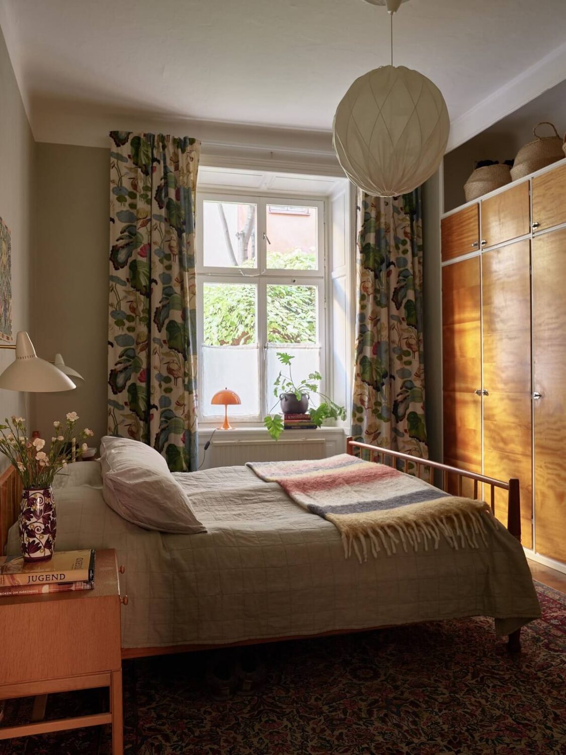 A Charming Vintage Apartment in Stockholm 11 vintage-bedroom-built-in-wardrobes-large-rug-nordroom