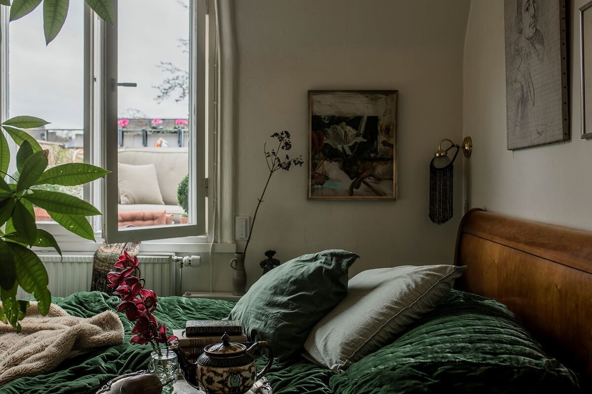 A Cozy Green Kitchen in a Vintage Attic Apartment 17 vintage-bedroom-green-bedding-nordroom