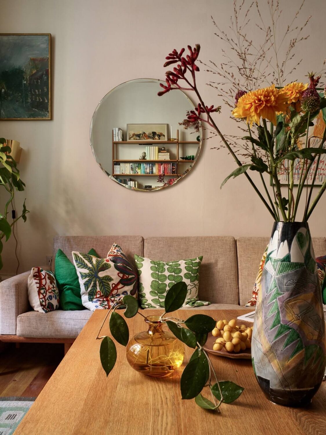 A Charming Vintage Apartment in Stockholm 3 vintage-style-living-room-round-mirror-nordroom