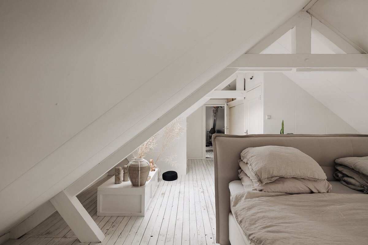 A Unique Black and White Home in a Former School Building 36 white-attic-bedroom-grey-bedframe-nordroom