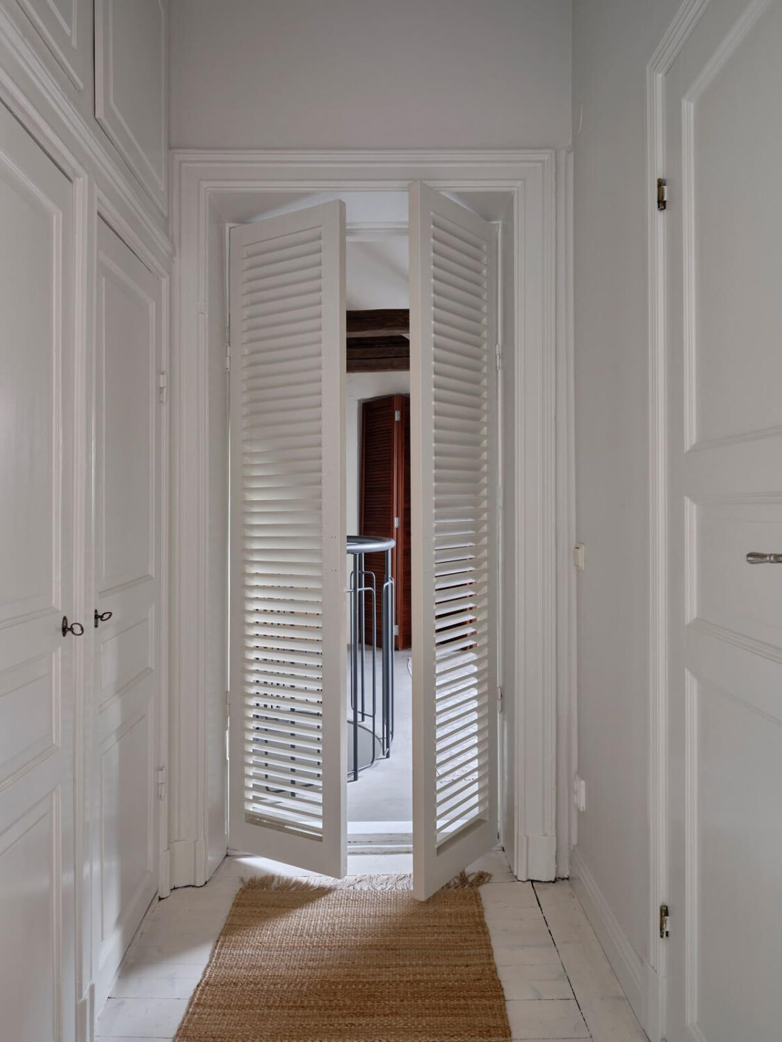 A Nordic Maisonette That Makes The Most Of Its Awkward Nooks 17 white-hallway-nordic-maisonette-nordroom