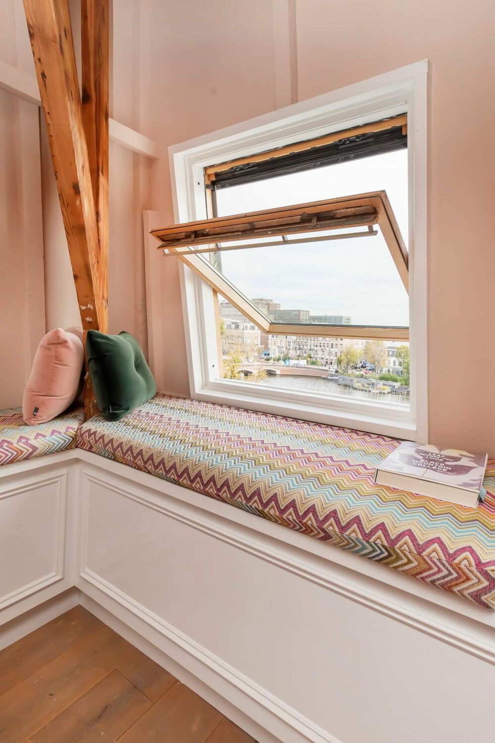 A Colorful Loft in Amsterdam with Exposed Wooden Beams 3 window-seat-colorful-loft-amsterdam-nordroom